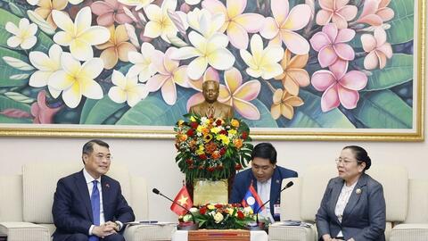 Đồng chí Lê Minh Hưng làm việc với Trưởng ban Tổ chức Trung ương Đảng Nhân dân Cách mạng Lào