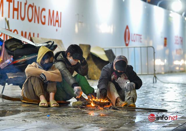 Hà Nội: Bê đá cây lạnh buốt, vầy nước đỏ tay trong chợ cá mưu sinh ngày giá rét - Ảnh 16.