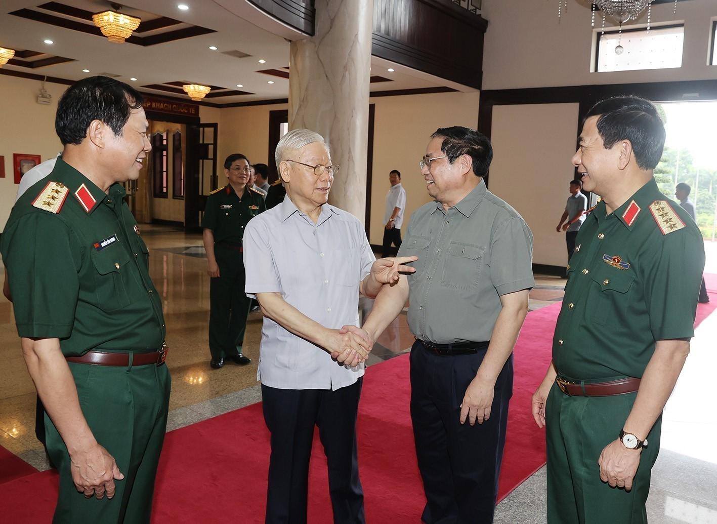 Tổng Bí thư Nguyễn Phú Trọng, Thủ tướng Chính phủ Phạm Minh Chính, Đại tướng Phan Văn Giang - Bộ trưởng Bộ Quốc phòng đến dự Hội nghị Quân uỷ Trung ương. Ảnh: TTXVN