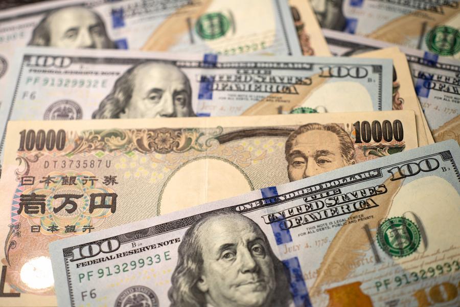 USD tăng hơn 1% so với đồng yên Nhật ngày 9.4. Ảnh: Xinhua