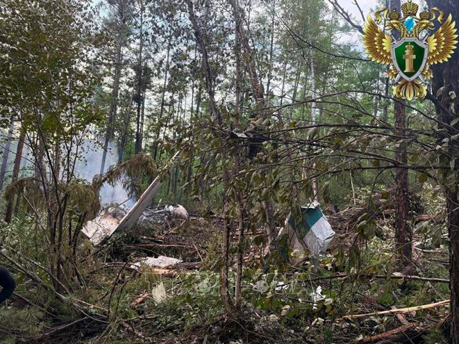 Hiện trường vụ rơi máy bay Antonov An-24 của hãng hàng không Angara Airlines ở tỉnh Amur, Nga ngày 24/7/2025. Ảnh: THX/TTXVN