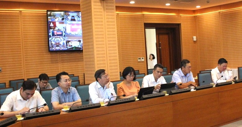 Các đại biểu tham dự Hội nghị trực tuyến toàn quốc thúc đẩy đầu tư công năm 2025 tại điểm cầu Hà Nội. Ảnh: Đình Hiệp